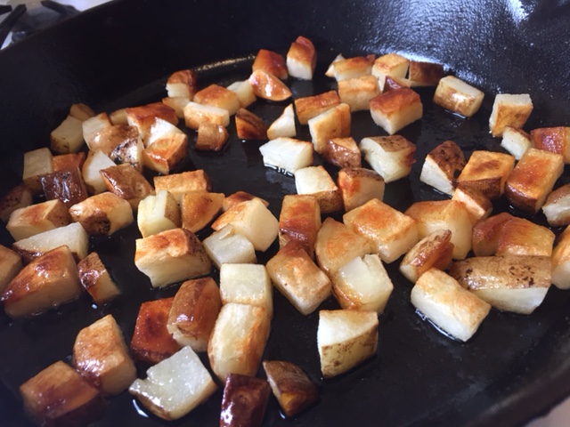 Potatoes fried to a crispy golden brown