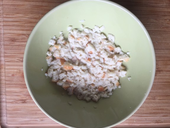 Bread cubes soaking in milk