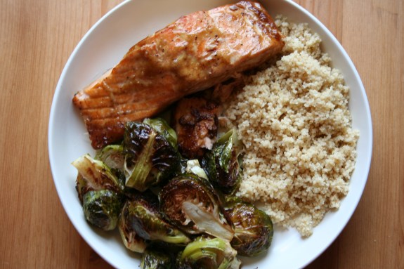 Baked salmon with couscous and roasted brussels sprouts