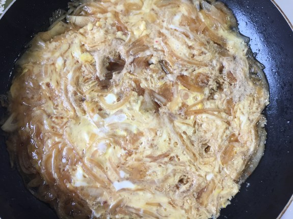 Cooked egg onion and dashi stock